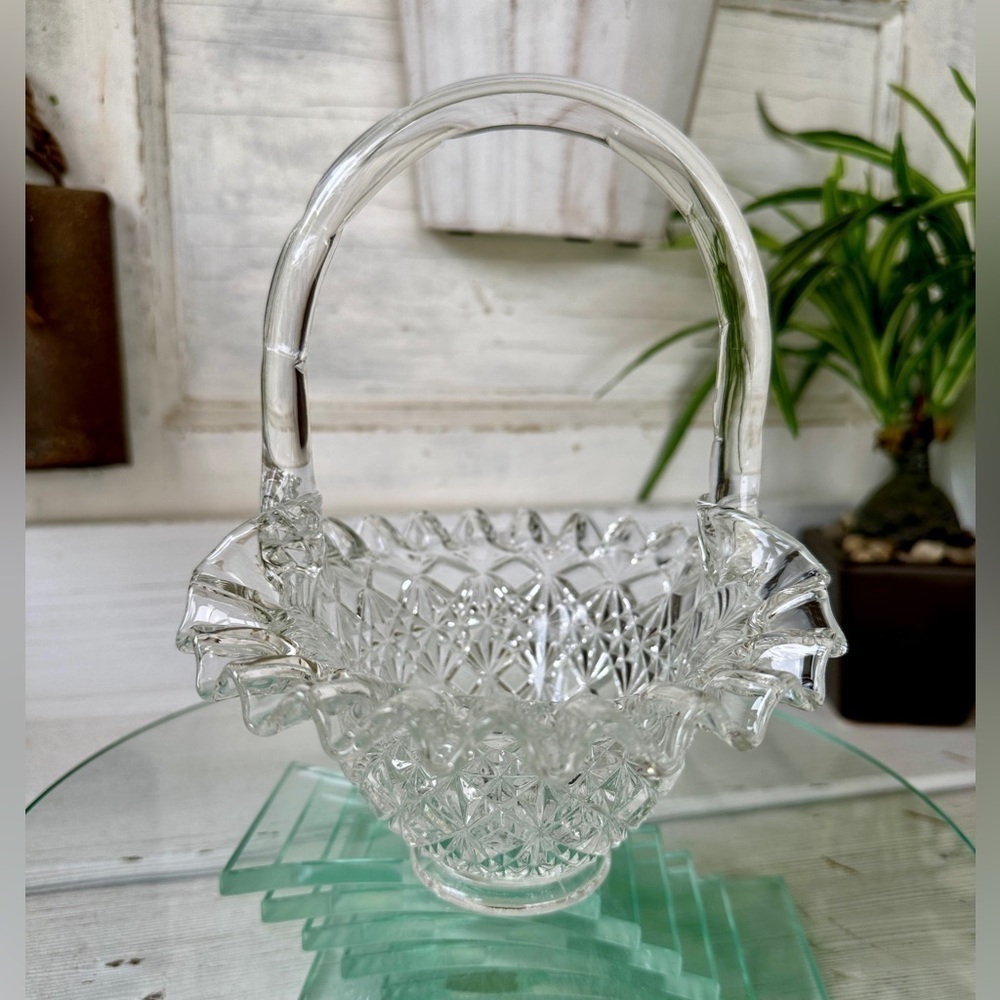 FENTON, ANTIQUE, CLEAR GLASS BASKET WITH FLUTED RIM. NO CHIPS OR CRACKS.